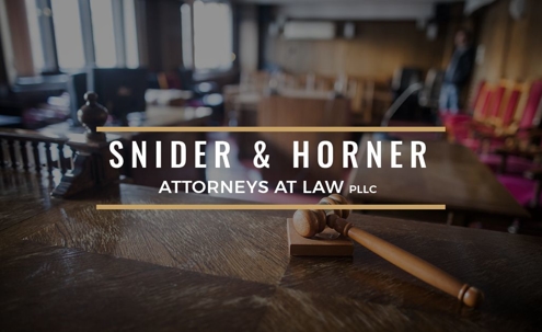 courtroom empty with a gavel on the desk