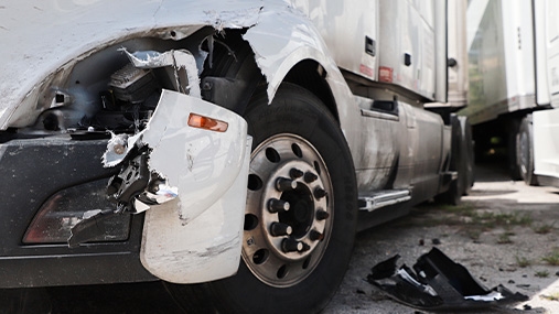 front of semi truck with damage