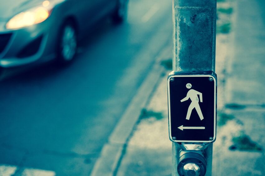 Pedestrian crossing sign at intersection
